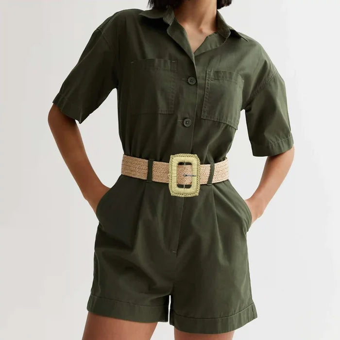 Ani Accessories female model wearing double layer braided rectangle buckle with prong with beige belt on a olive green shorts jumpsuit in a white background