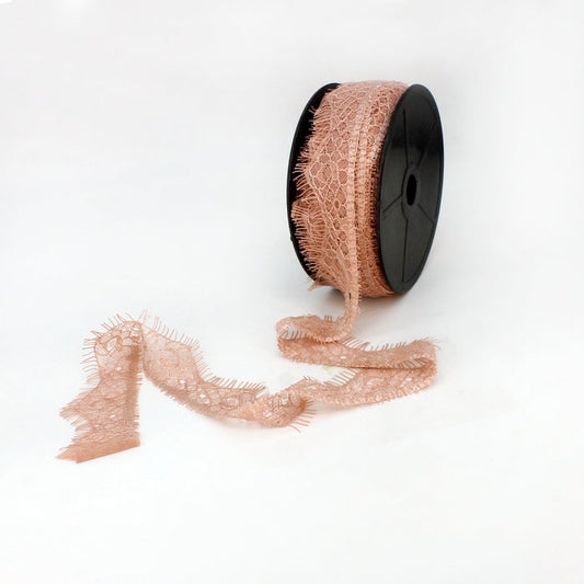 Roll of Peach Eyelash Trim Lace Fabric by Ani Accessories for crafting. Buy now for stylish embellishments.