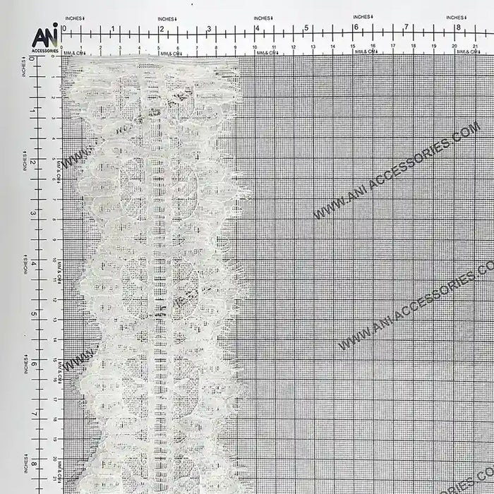 Buy Lace Fabric Premium Soft & Elegant Lace | Ani Accessories on a grid background showcasing intricate patterns