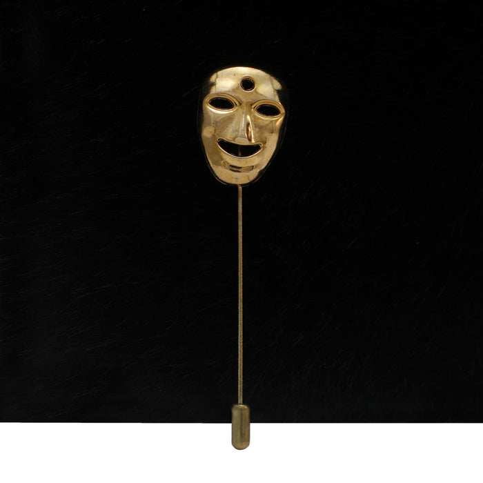 Gold mask lapel pin by Ani Accessories featuring a unique mask design for stylish accessories