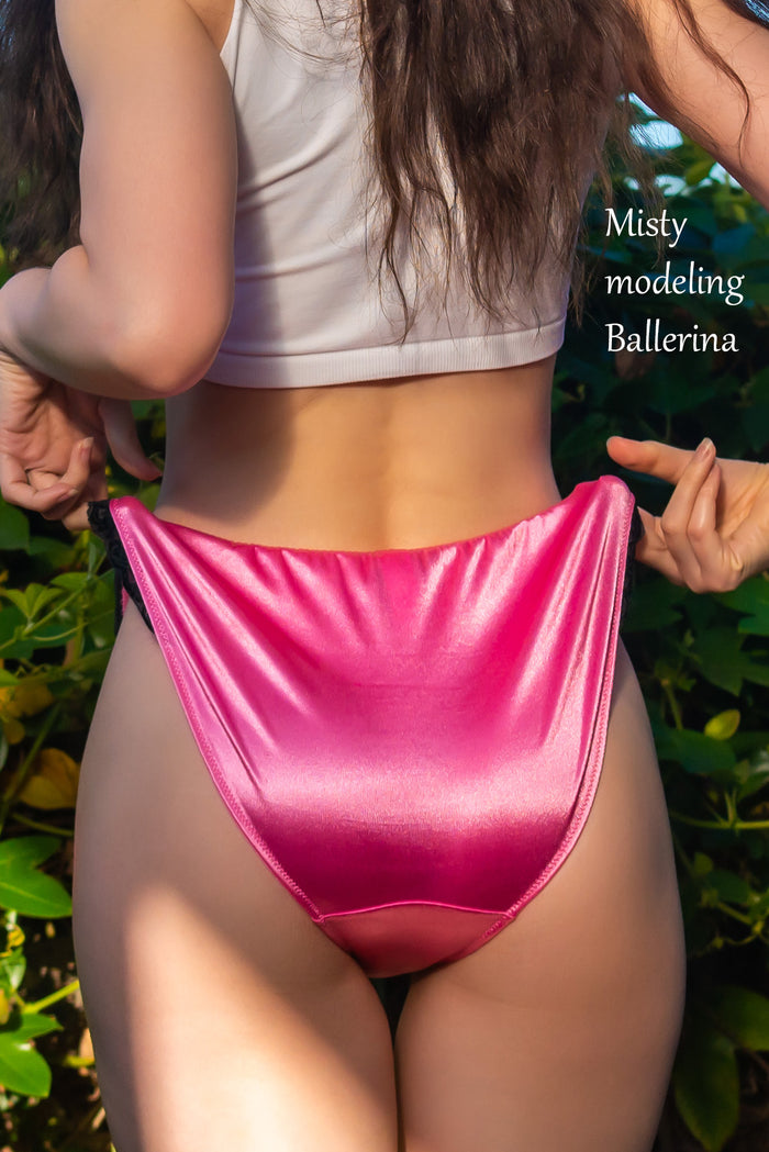 Hot pink satin bikini panties with black lace trim at the leg openings