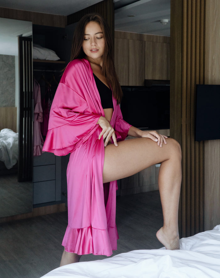 Bright pink satin long robe with tie belt and layered ruffle hem, open front