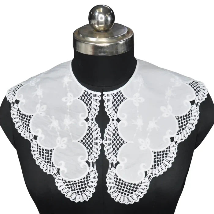 Feminine Broderie Anglaise Peter Pan collar adorned with detailed eyelet embroidery and elegant finish