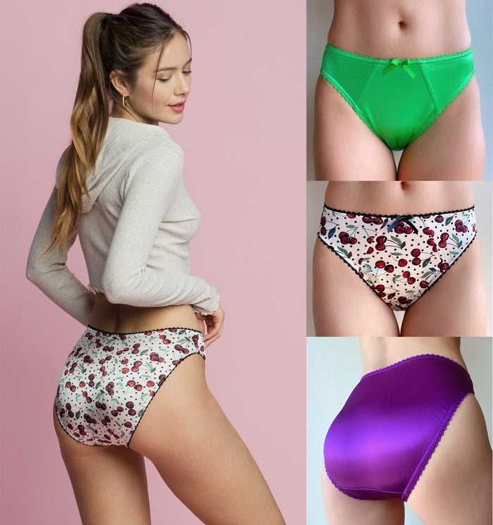 Cherry print panties with dark scalloped lace trim and elastic waist, white base
