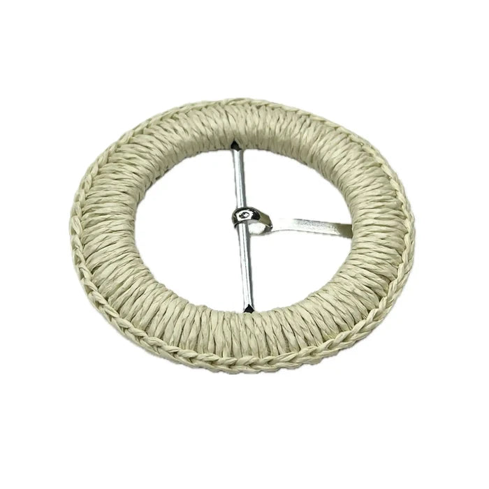 Ani Accessories back sided view of braided woven cream circular raffia buckle with prong on a white background.