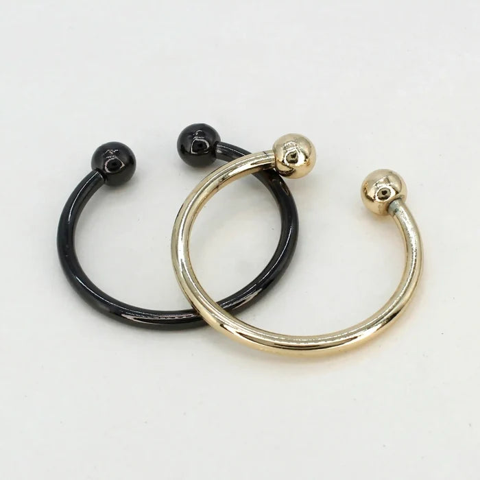Ani Accessories Curved Circular Elegance Gold &Black Metal Buckle  placing together in the white background.
