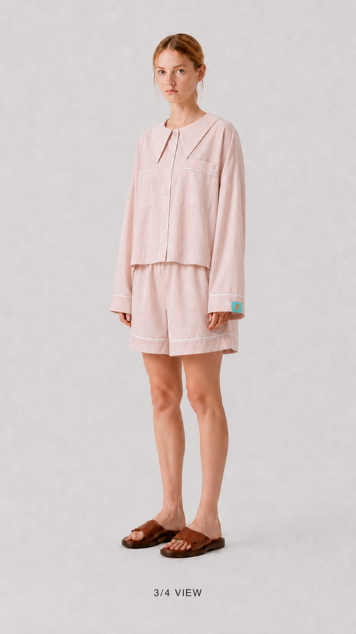 front view Woman wearing the PEKGEE Dream Of Tone Dream Petal Korean cotton linen pyjama set long sleeve short pants.