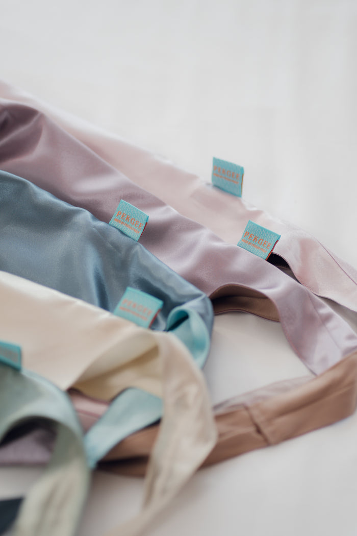 Close-up of the PEKGEE FairyTale Tote Bag showcasing the premium satin fabric, neat stitching, durable shoulder straps, and handcrafted details.