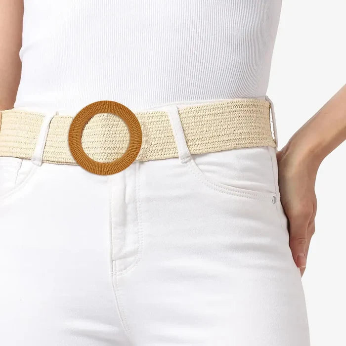 Ani Accessories Finest-Detailing Imitation Raffia Round Buckle on belt of raffia wearing on the model white jean in a white background.