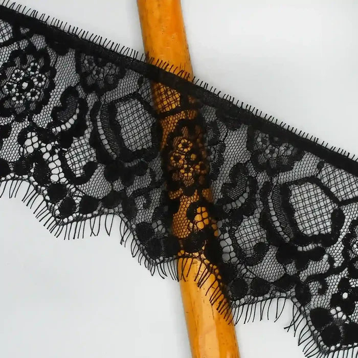 Black Floral Lace Trim Eyelash for Sewing & Crafts | Ani Accessories displayed on a wooden background