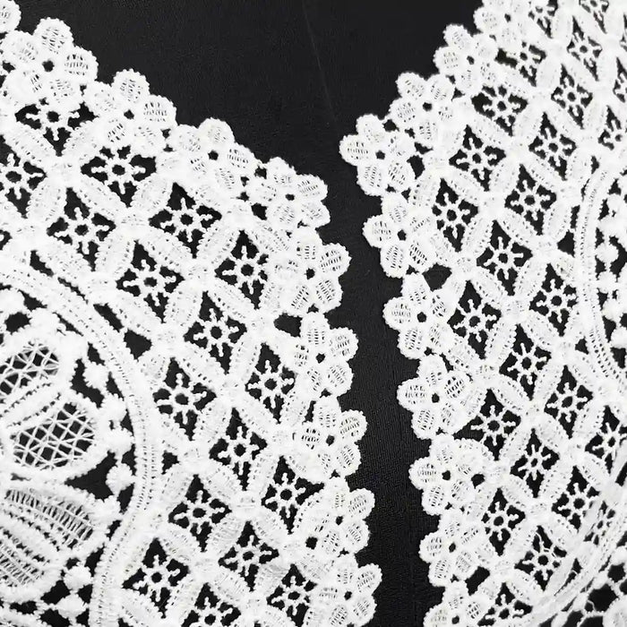 Close-up of V round floral design neckline by Ani Accessories highlighting fine detailing