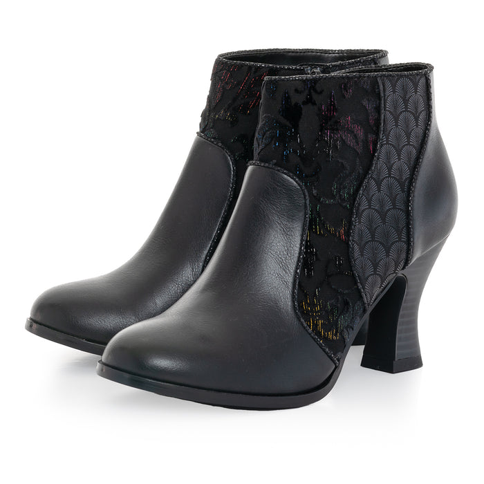 A pair of black ankle boots with a textured upper part and a heel, labeled as 'Leighton' by Ruby Shoo.