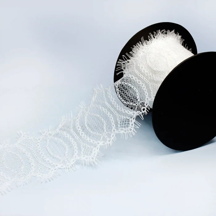 Buy Elegant Eyelash Lace Trim for Dresses & Crafts | Ani Accessories on a spool with intricate patterns