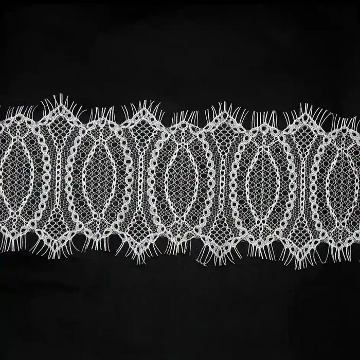Elegant Eyelash Lace Trim in white fabric perfect for dresses and crafts by Ani Accessories