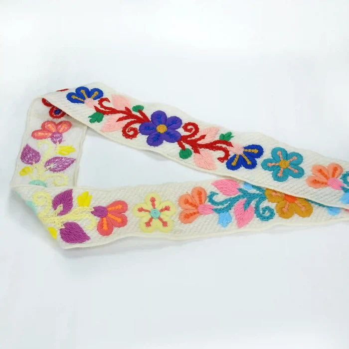 Embroidered Multicolor small flower crochet lace on a white background