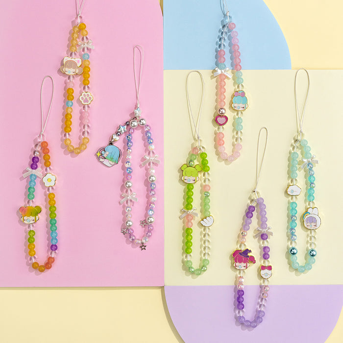 Seven Rolife Nanci Sweet Time phone lanyards in assorted pastel bead colors arranged across a pink and yellow pastel geometric backdrop.