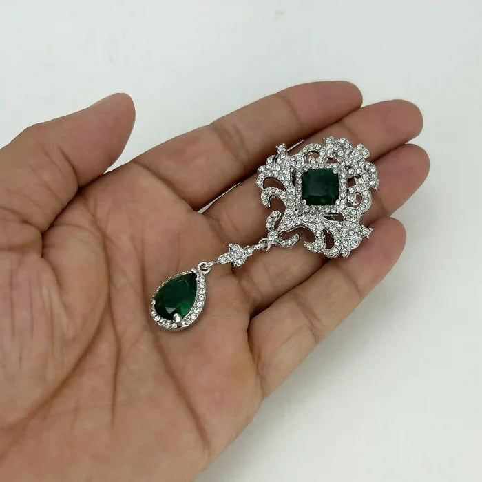 Ornate Emerald Dangle Brooch