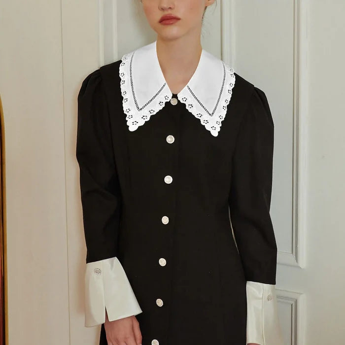 Elegant Pilgrim Flower Peter Pan collar showcasing floral threadwork and neat curved edge design