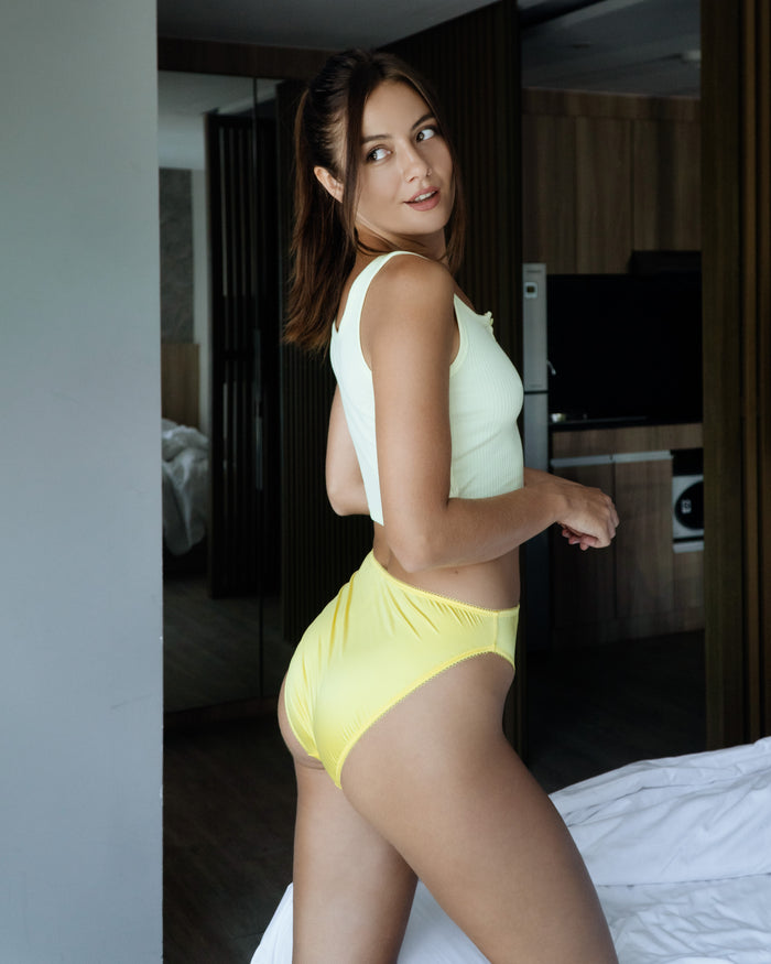 Jenny panties in sunshine yellow, high-rise briefs, side/back view.