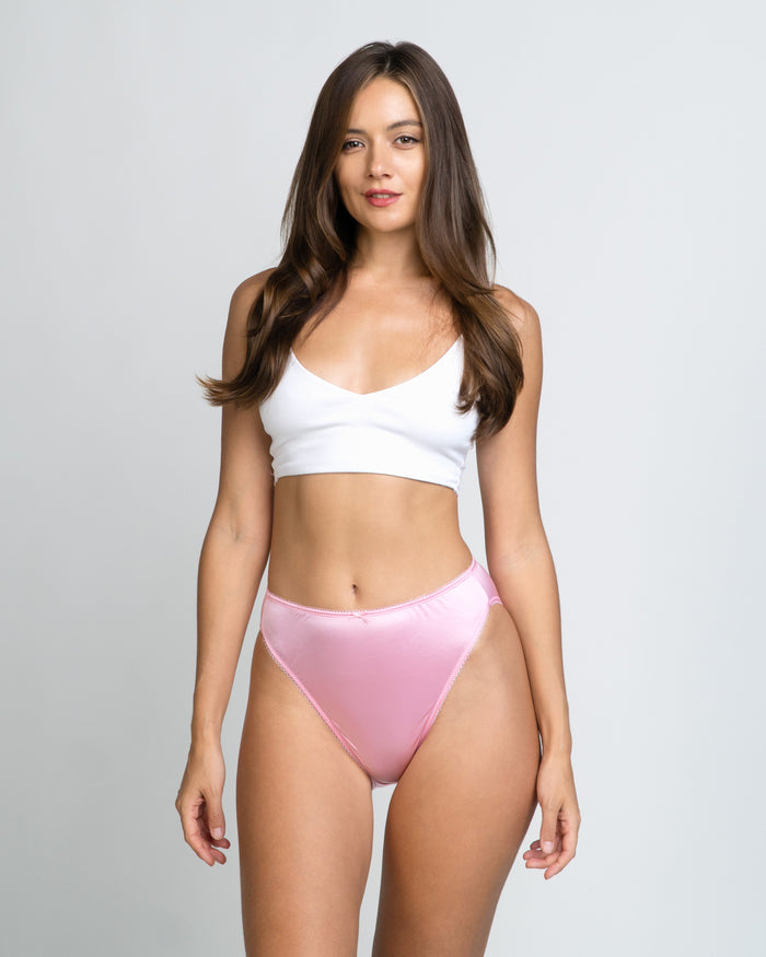 Light pink bikini panties with smooth finish and low-rise elastic waistband