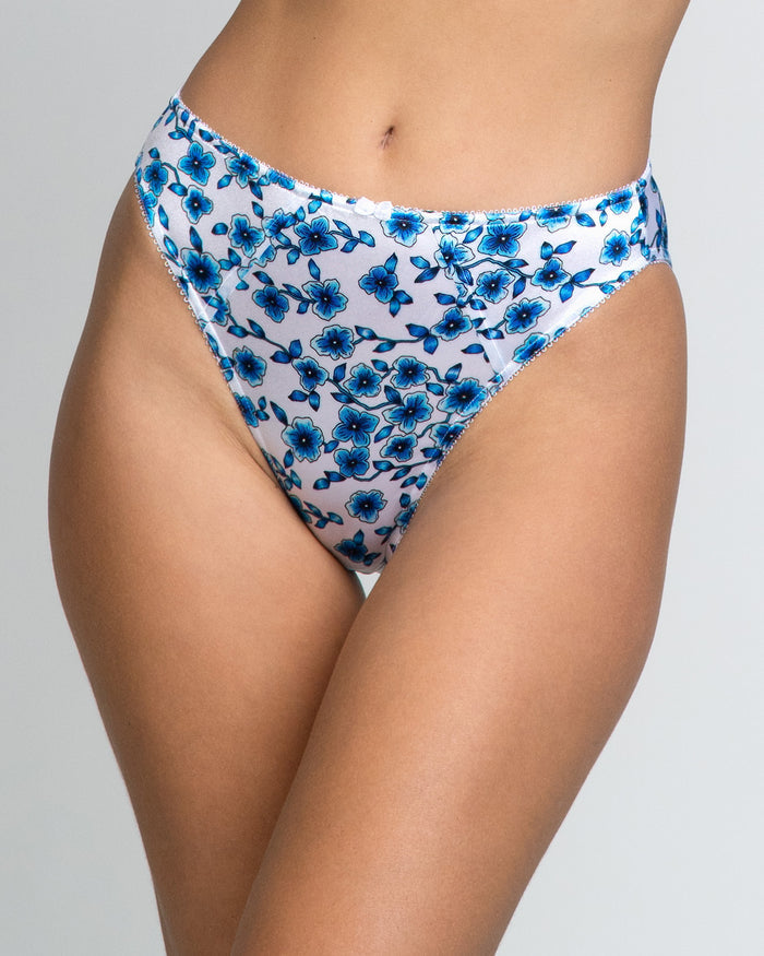 Blue floral bikini-cut panties with elastic waistband and matching patterned fabric.
