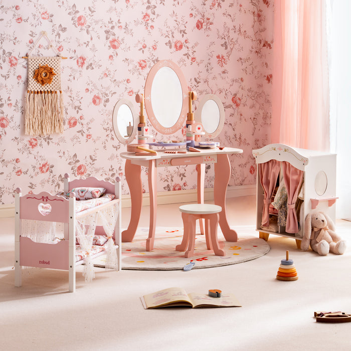 ROBUD pink princess play room featuring a triple vanity mirror doll cradle and fabric wardrobe on a floral backdrop.