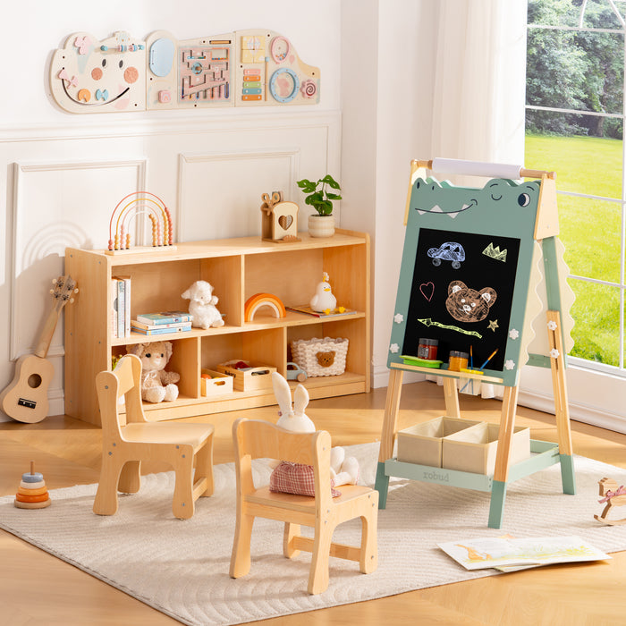 ROBUD little moments play set with dinosaur easel wooden table chairs and storage bookshelf in a bright playroom.
