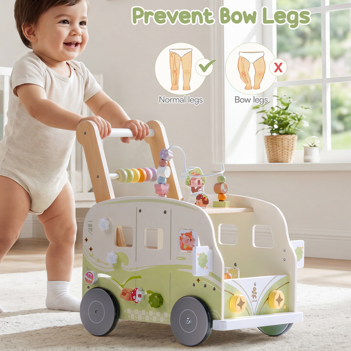 Baby pushes the ROBUD green forest vacation bus walker while a smiling mother sits beside on the floor cheering.