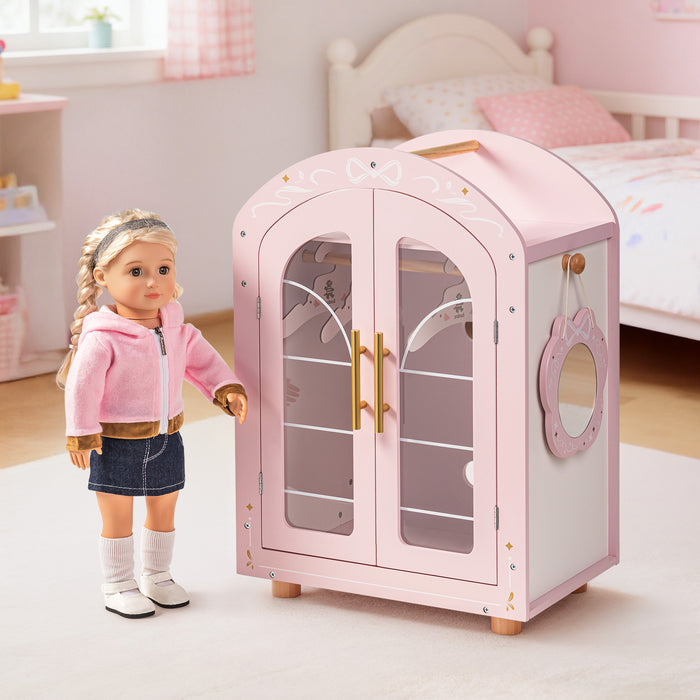 ROBUD pink wooden doll wardrobe front view with closed arched doors in a soft pink bedroom setting with fairy lights.