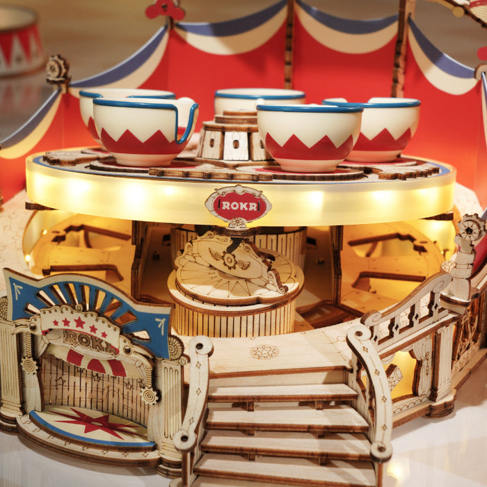 ROKR Tilt-A-Whirl Music Box EA04 mechanical music box wooden kit, front view on a neutral background