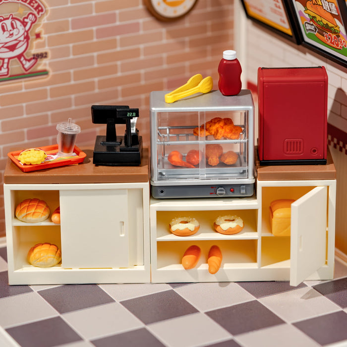 Rolife Yum Yum Burgers DW010 close up of the miniature fast food counter showing fried chicken warmer cash register soda machine and baked goods