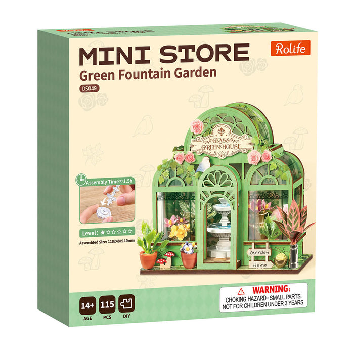 Rolife Green Fountain Garden Miniature House DS049 DIY miniature house kit, styled lifestyle scene with model assembled