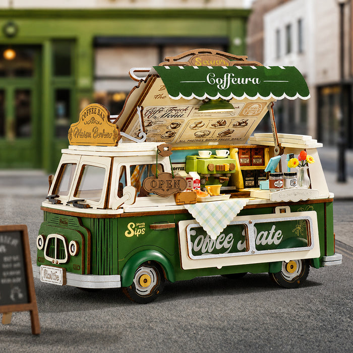Rolife Leo's Coffee Truck on cobblestone street with cafe windows and chalkboard menu sign in background