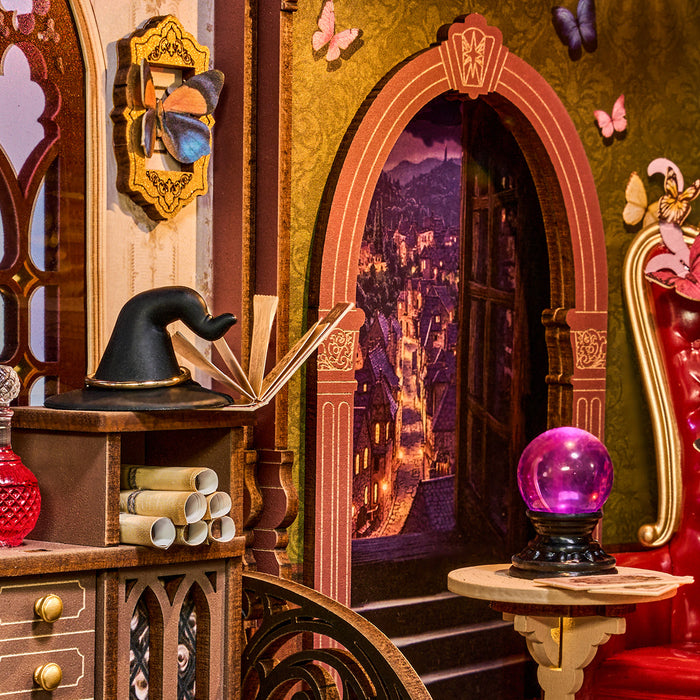 Rolife Magic Fantasy Corner TGB14 interior close-up showing witch hat, scrolls, purple crystal ball table, and moonlit archway backdrop