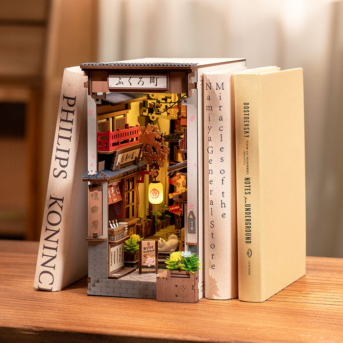 Rolife DIY miniature book nook TGB11, top-down view of components