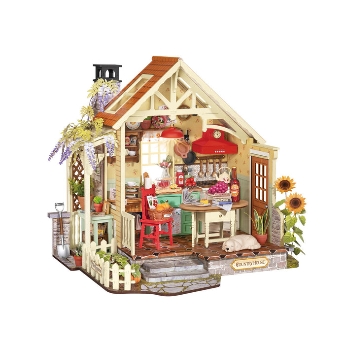 Rolife miniature farmhouse kit showing a timber-framed cottage with sunflowers and a red dining set inside