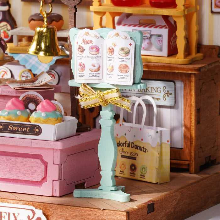 Rolife Sweetie's Donut Shop Miniature House DS051 DIY miniature house kit, close-up of interior components and accessories