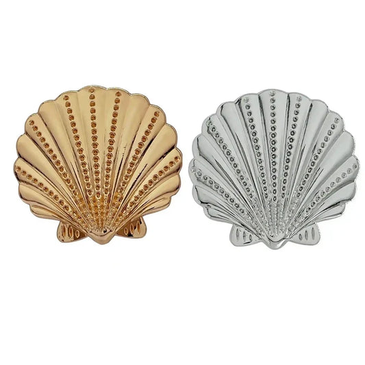 Buy now Ani Accessories Scallop Shell Metal Buckle placed on the white background to show the reflection of the buckle.