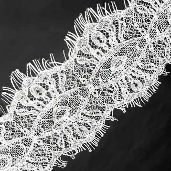 White Scalloped Edge Eyelash Lace with Intricate Patterns for Crafting and Fashion Projects