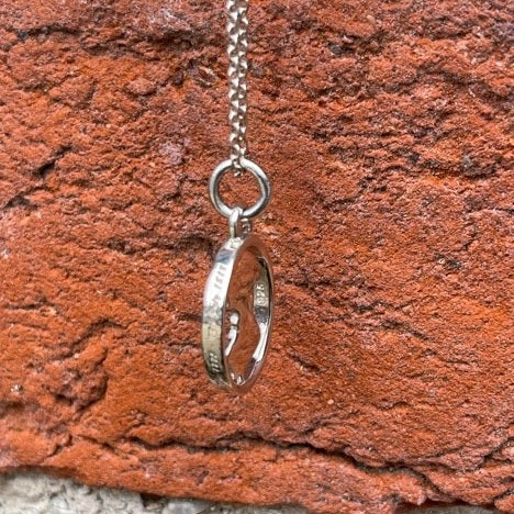 Silver Silhouette Spinner Necklace