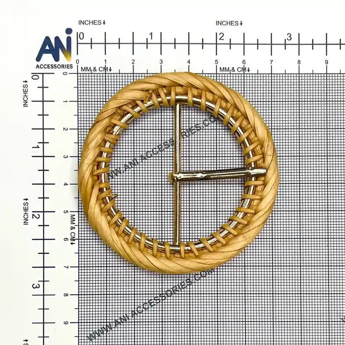 Ani Accessories circle single braided raffia buckle placed on a size bar graph sheet to show exact size of buckle