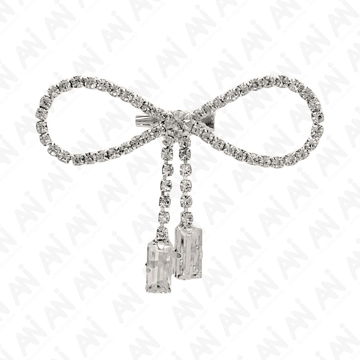 Sparkling Bow Brooch with Hanging Sapphire Two Stone, featuring shimmering crystals and elegant design