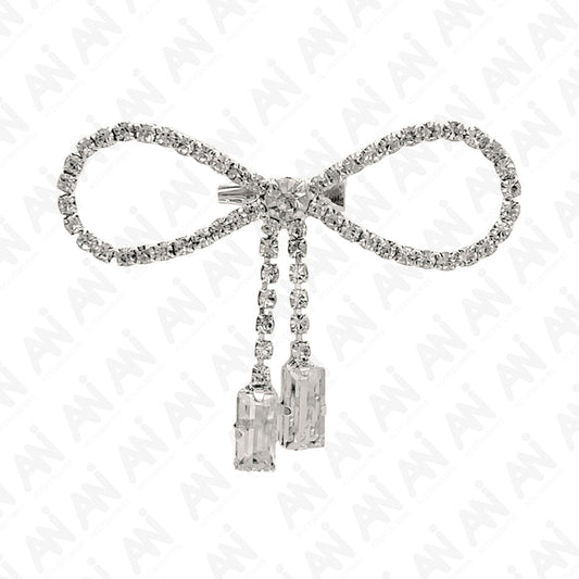 Sparkling Bow Brooch with Hanging Sapphire Two Stone, featuring shimmering crystals and elegant design
