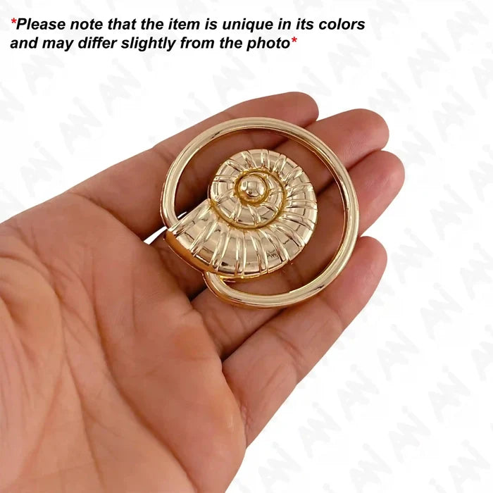 Ani Accessories Spiral Shell Gold Shiny Buckle hold on the hand to show the buckle with caution  text of product may differ from the image.