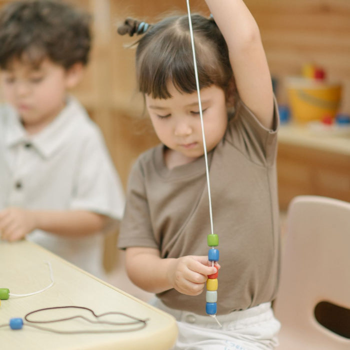 Threading Beads - Babies in Bloom