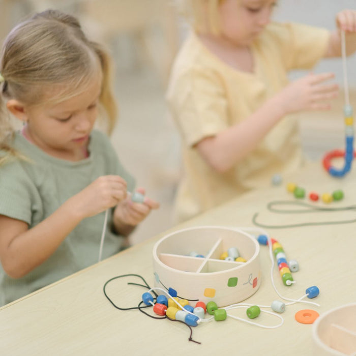 Threading Beads - Babies in Bloom