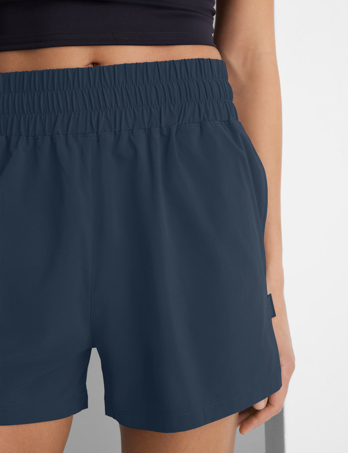 Women's Luxe Traveler Woven Short::Dress Blues